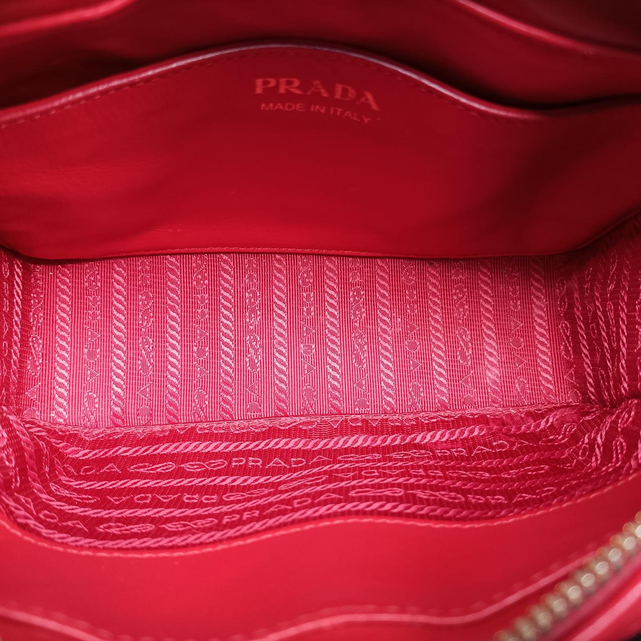 Pre-owned Prada Impunture Diagramme Red leather 1BH102 shoulderbag | stylenewstar