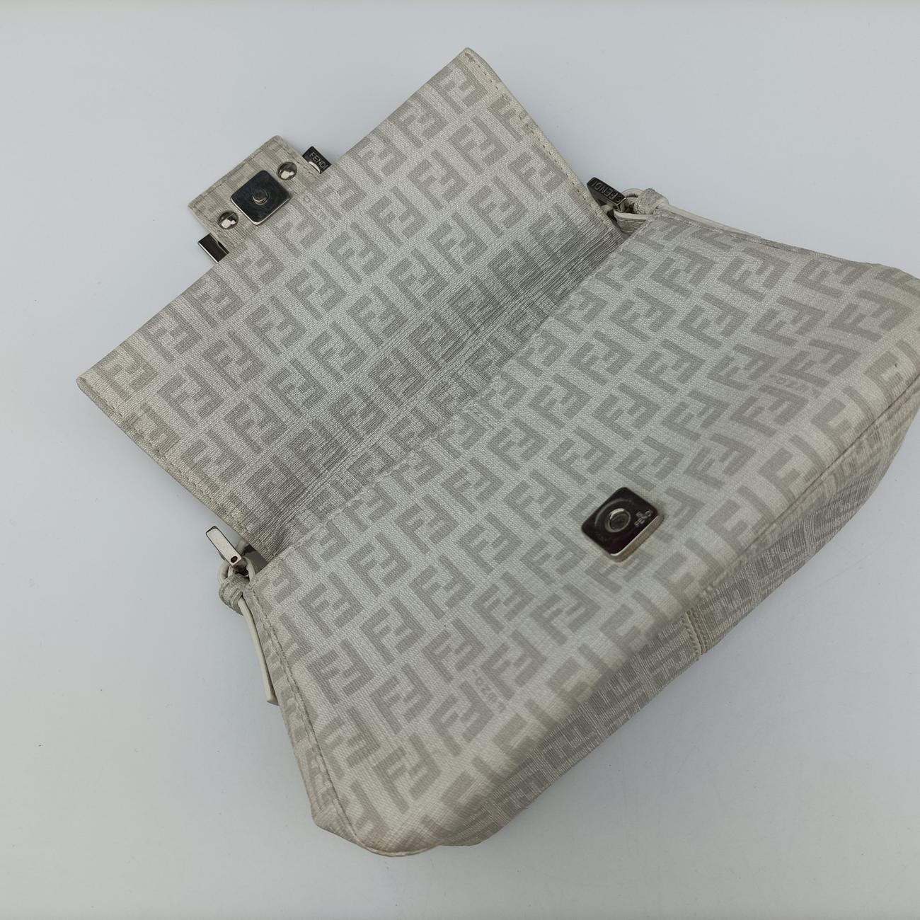 Pre-owned Fendi Baguette White PVC coated canvas 8BR180 handbag | stylenewstar