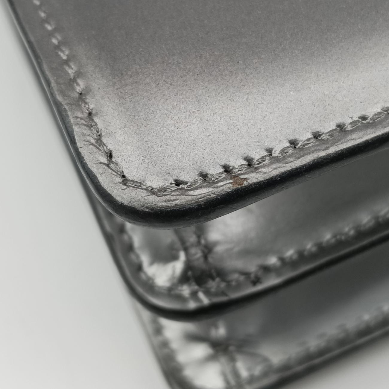 Secondhand Prada Logo Plaque Silver Leather  shoulderbag | stylenewstar