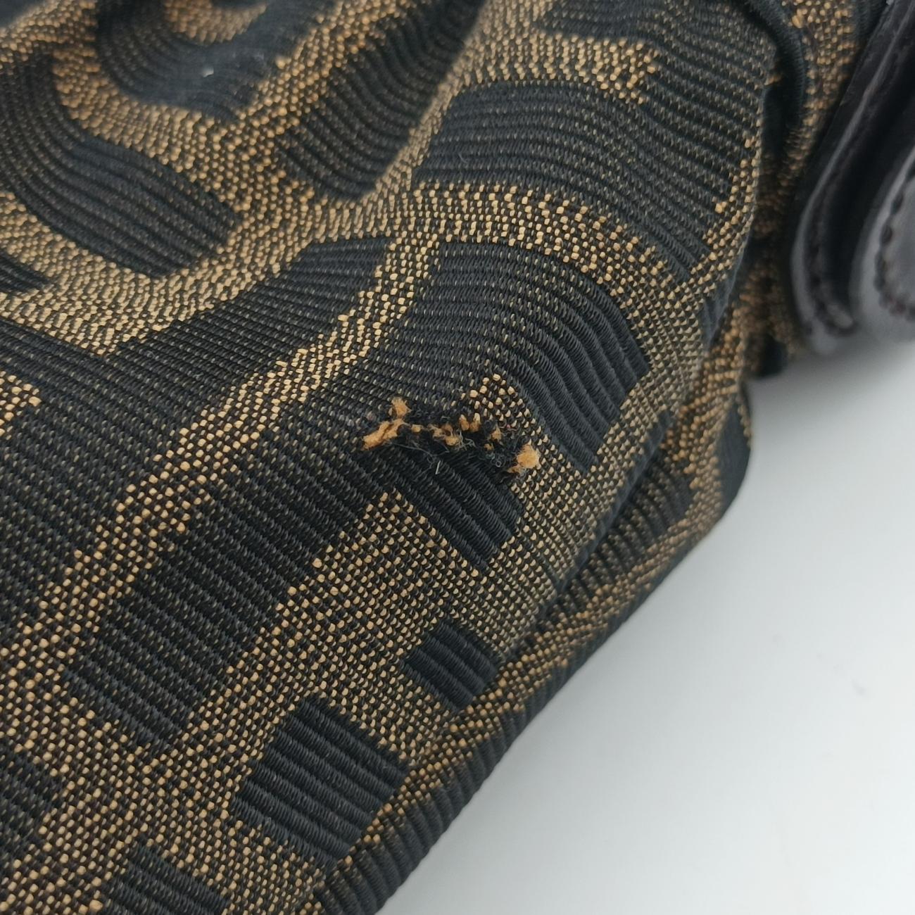 Pre-owned Fendi Chef Perforated Charm Zucca Print Brown PVC coated canvas 8BR436 shoulderbag | stylenewstar