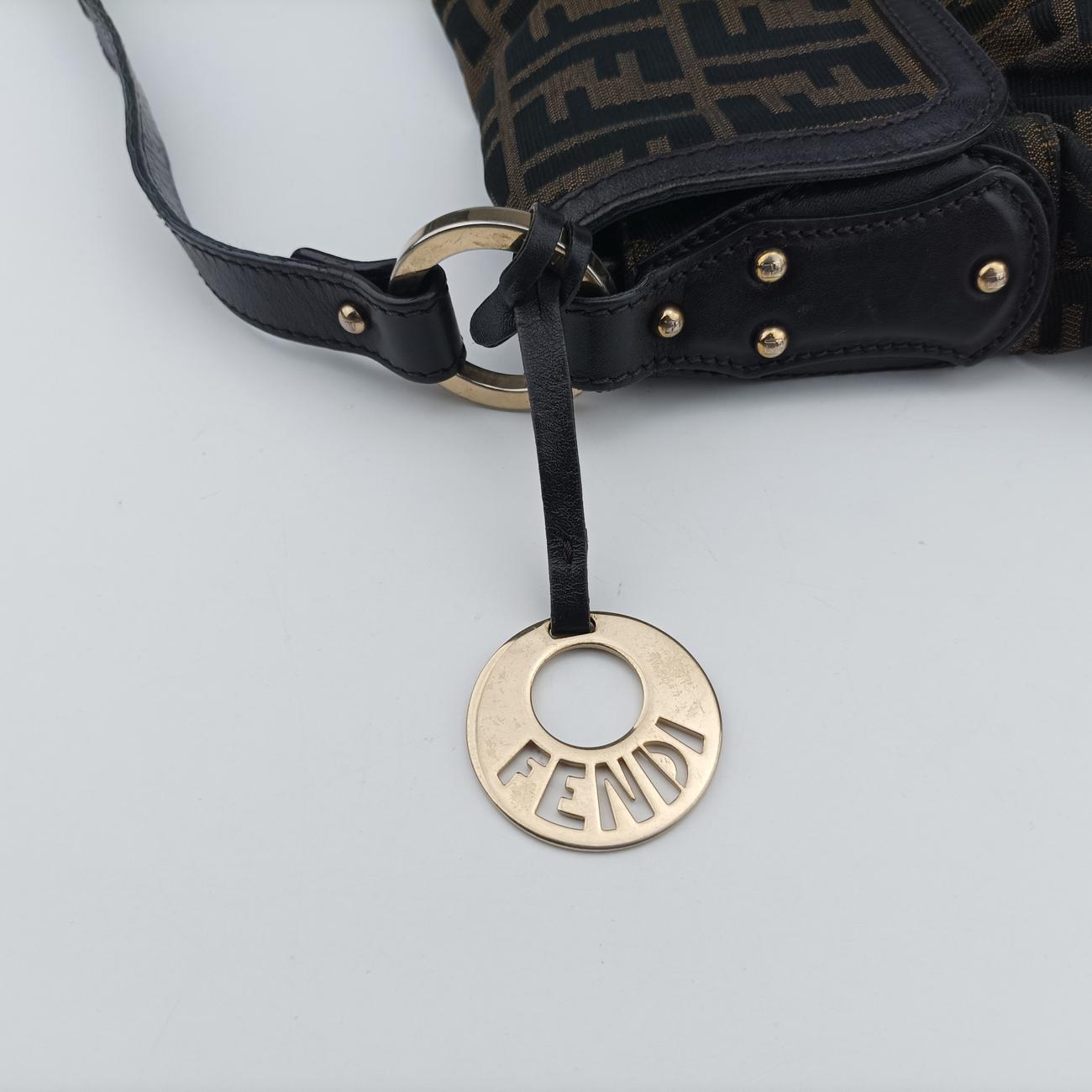 Pre-owned Fendi Chef Perforated Charm Zucca Print Brown PVC coated canvas 8BR436 shoulderbag | stylenewstar