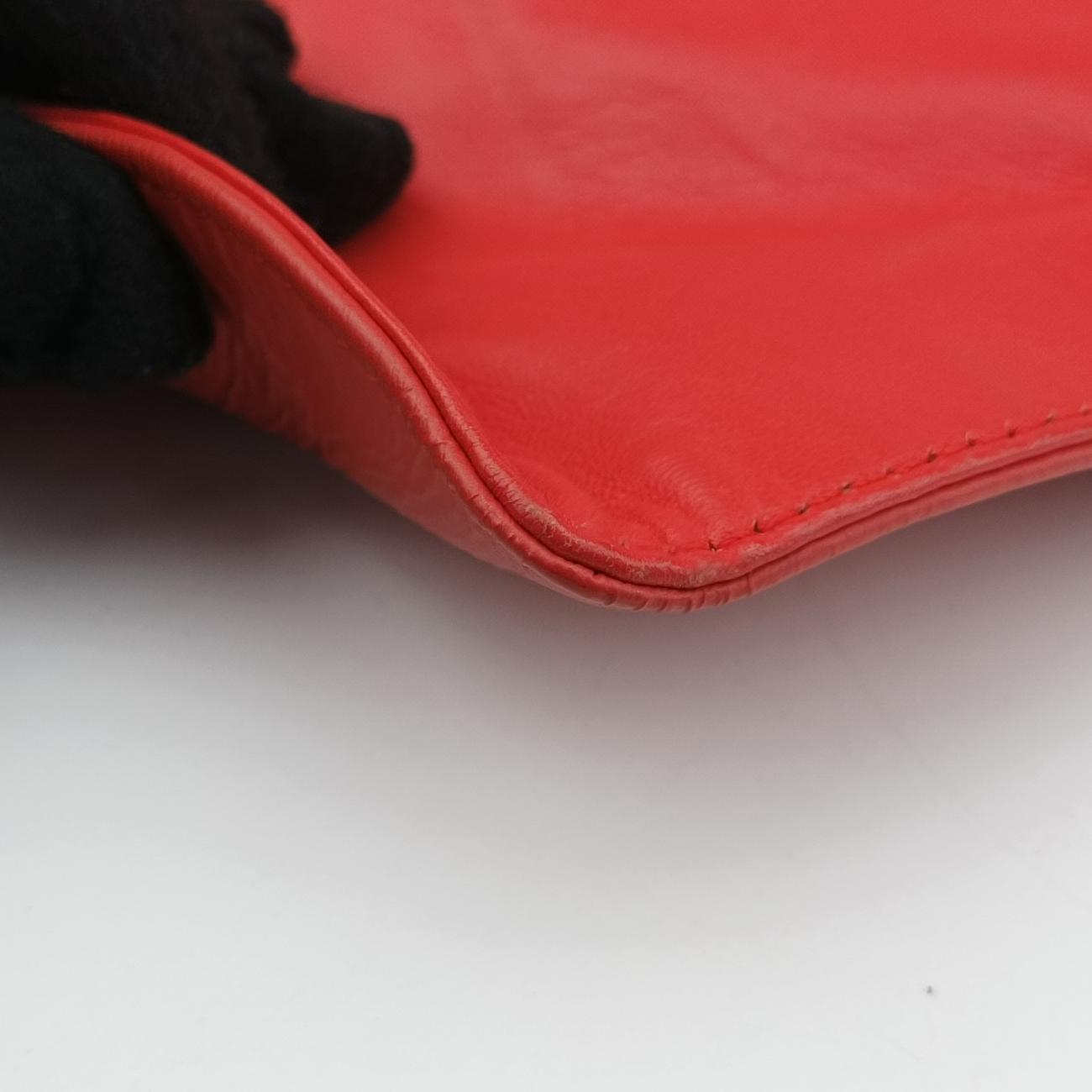 Secondhand Balenciaga Envelop Orange Leather  clutchbag | stylenewstar