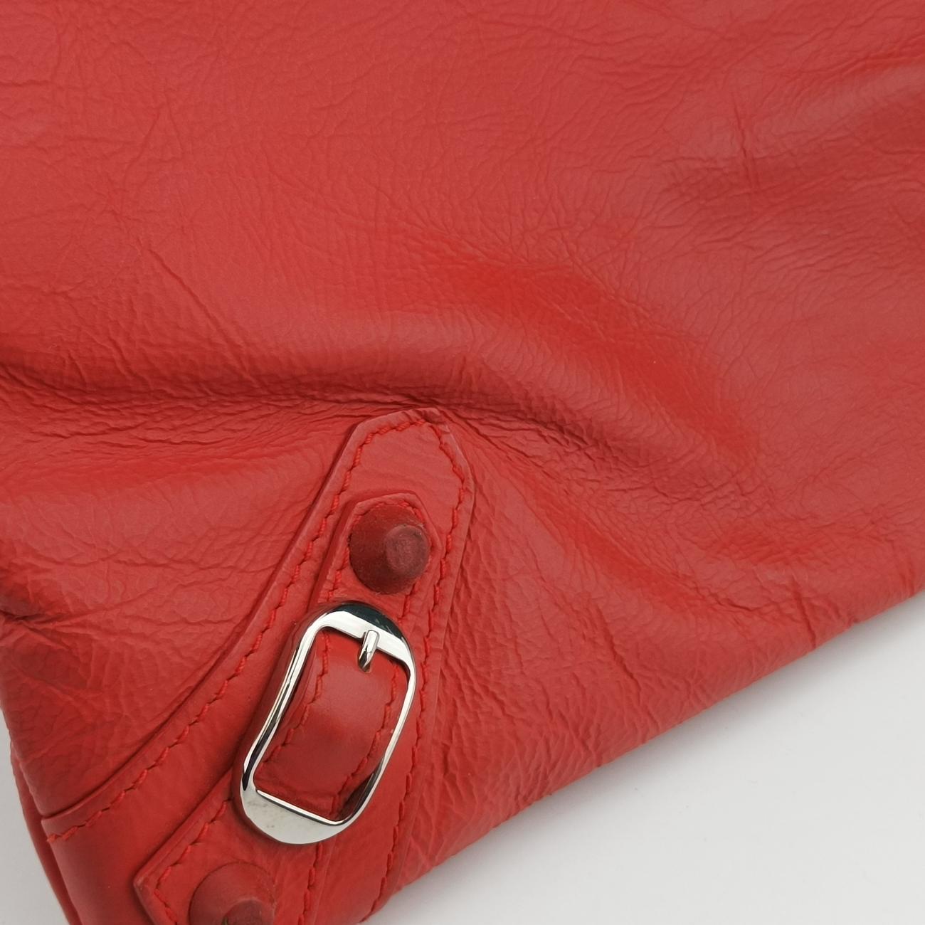 Secondhand Balenciaga Envelop Orange Leather  clutchbag | stylenewstar