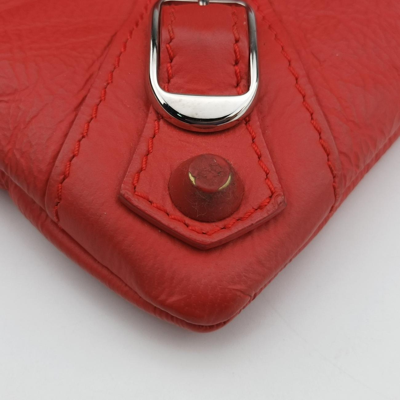 Secondhand Balenciaga Envelop Orange Leather  clutchbag | stylenewstar