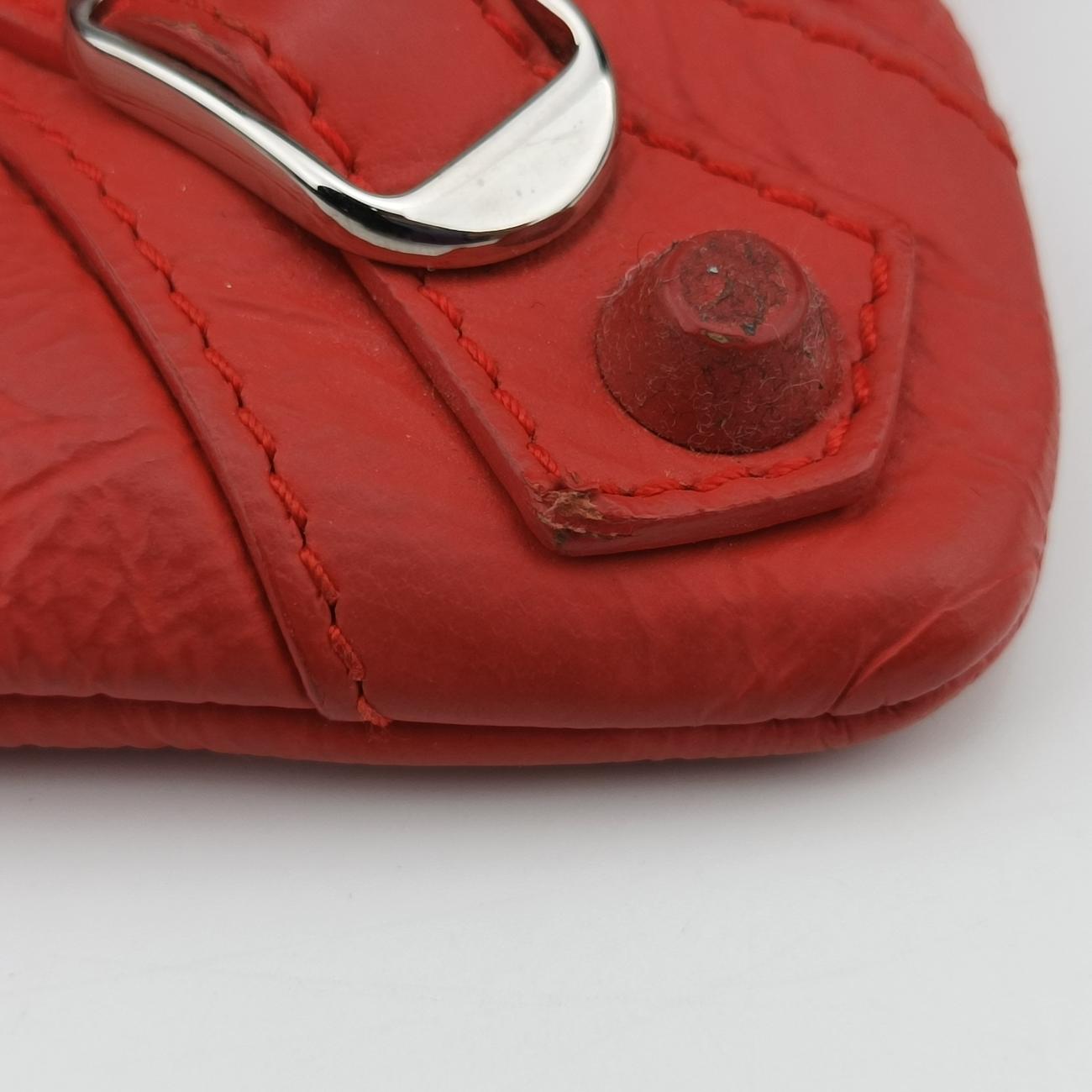 Secondhand Balenciaga Envelop Orange Leather  clutchbag | stylenewstar