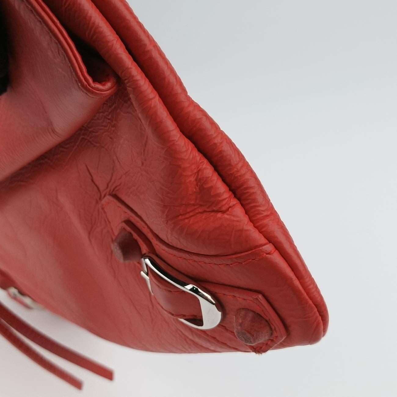 Secondhand Balenciaga Envelop Orange Leather  clutchbag | stylenewstar