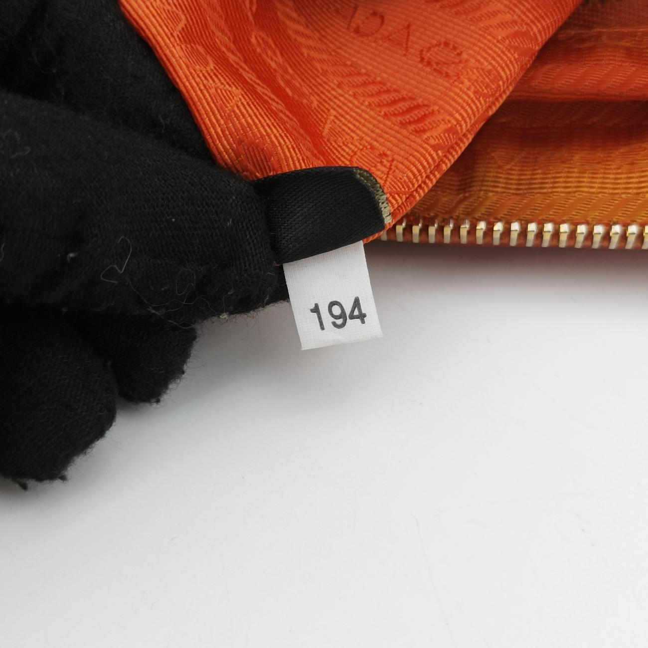 Vintage Prada Triangle Logo Orange nylon  shoulderbag | stylenewstar