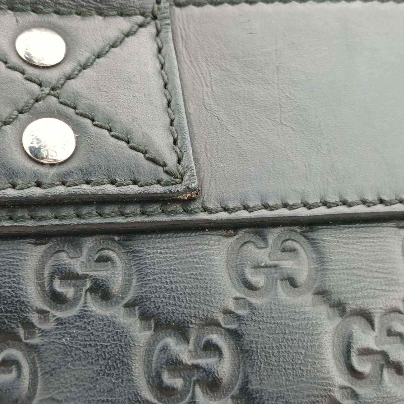 Vintage Gucci Guccissima Black Leather 246410 handbag | stylenewstar