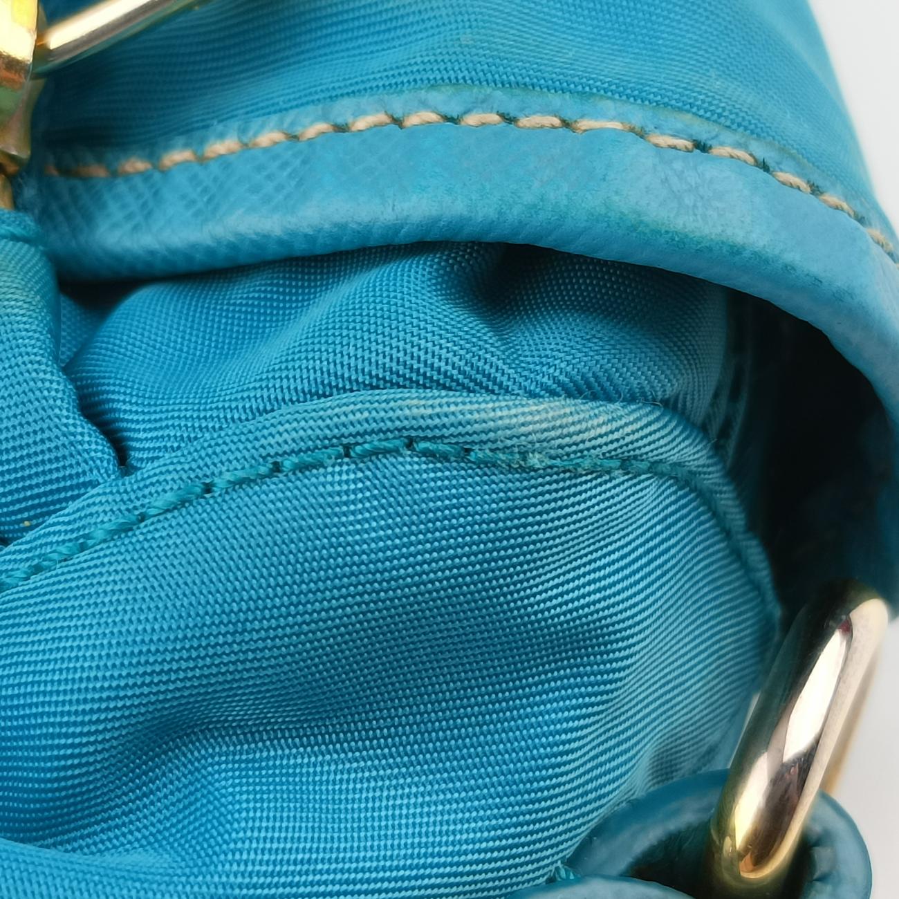 Pre-owned Prada buckle messenger Blue Nylon  shoulderbag | stylenewstar